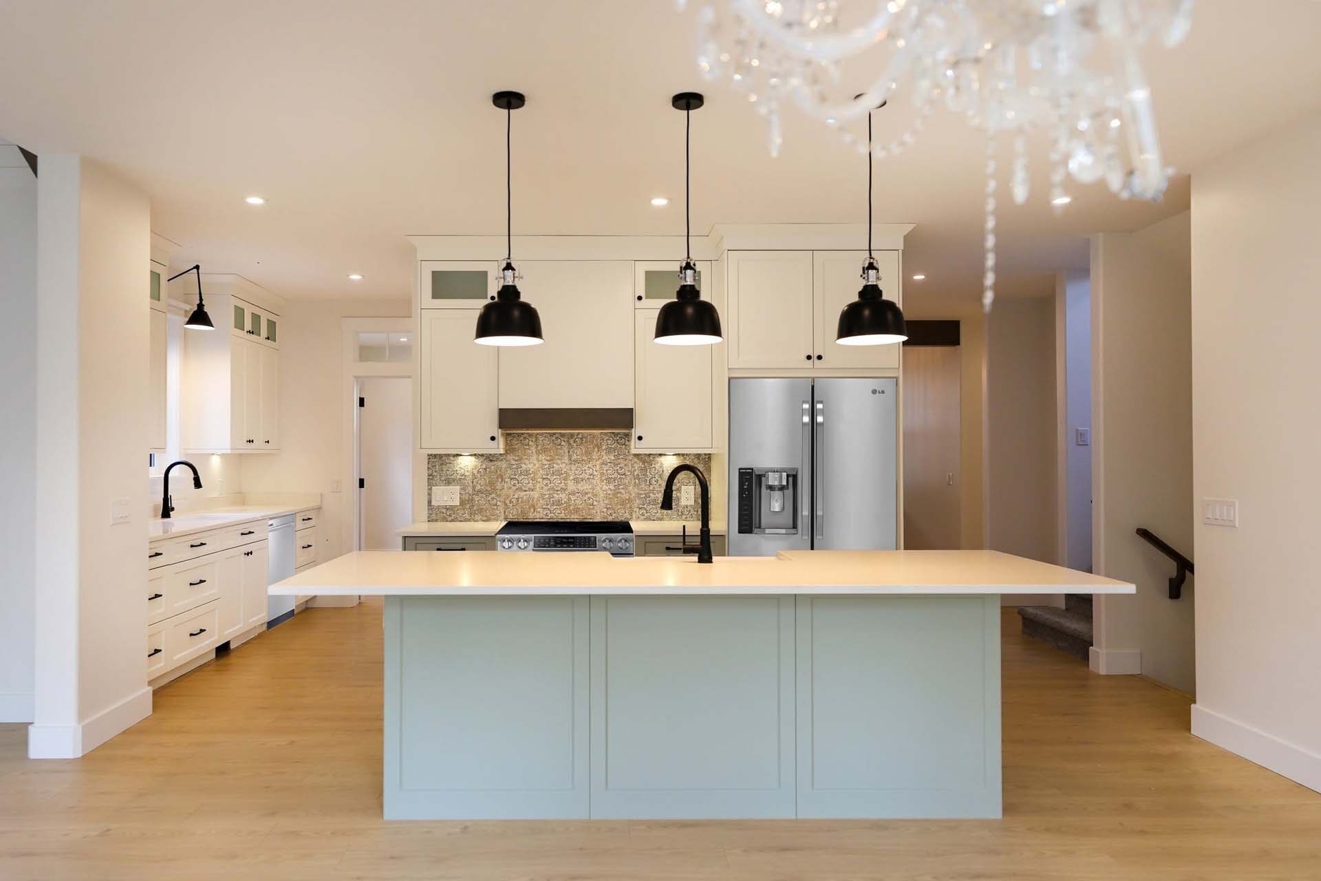 White quartz countertops in an open custom kitchen