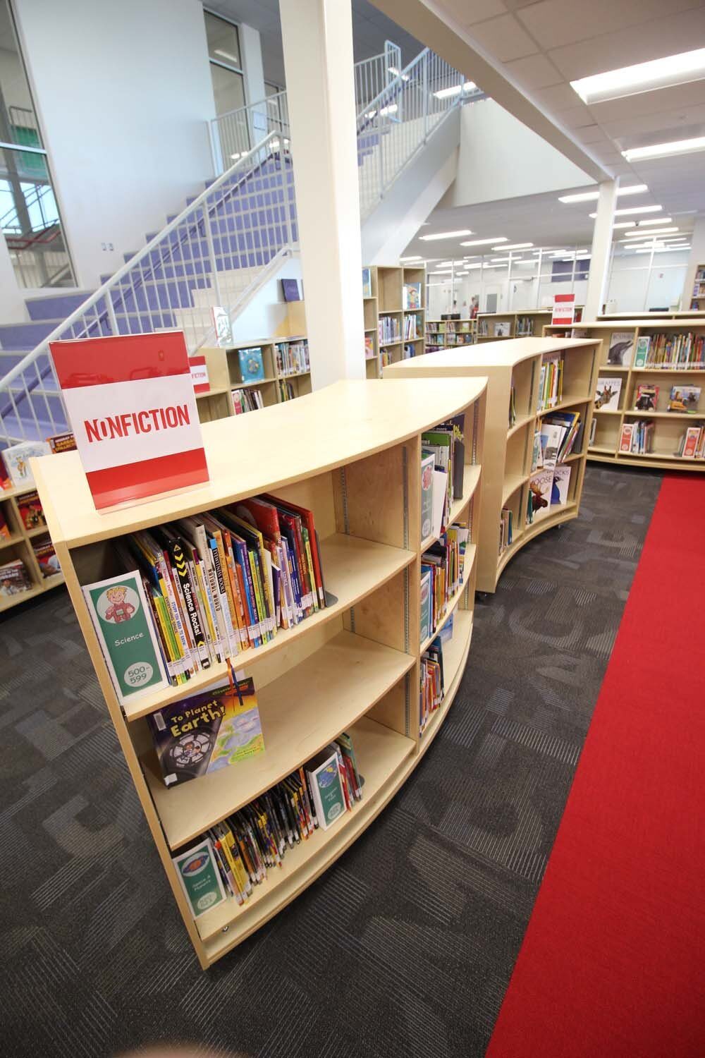 Nonfiction curved shelving