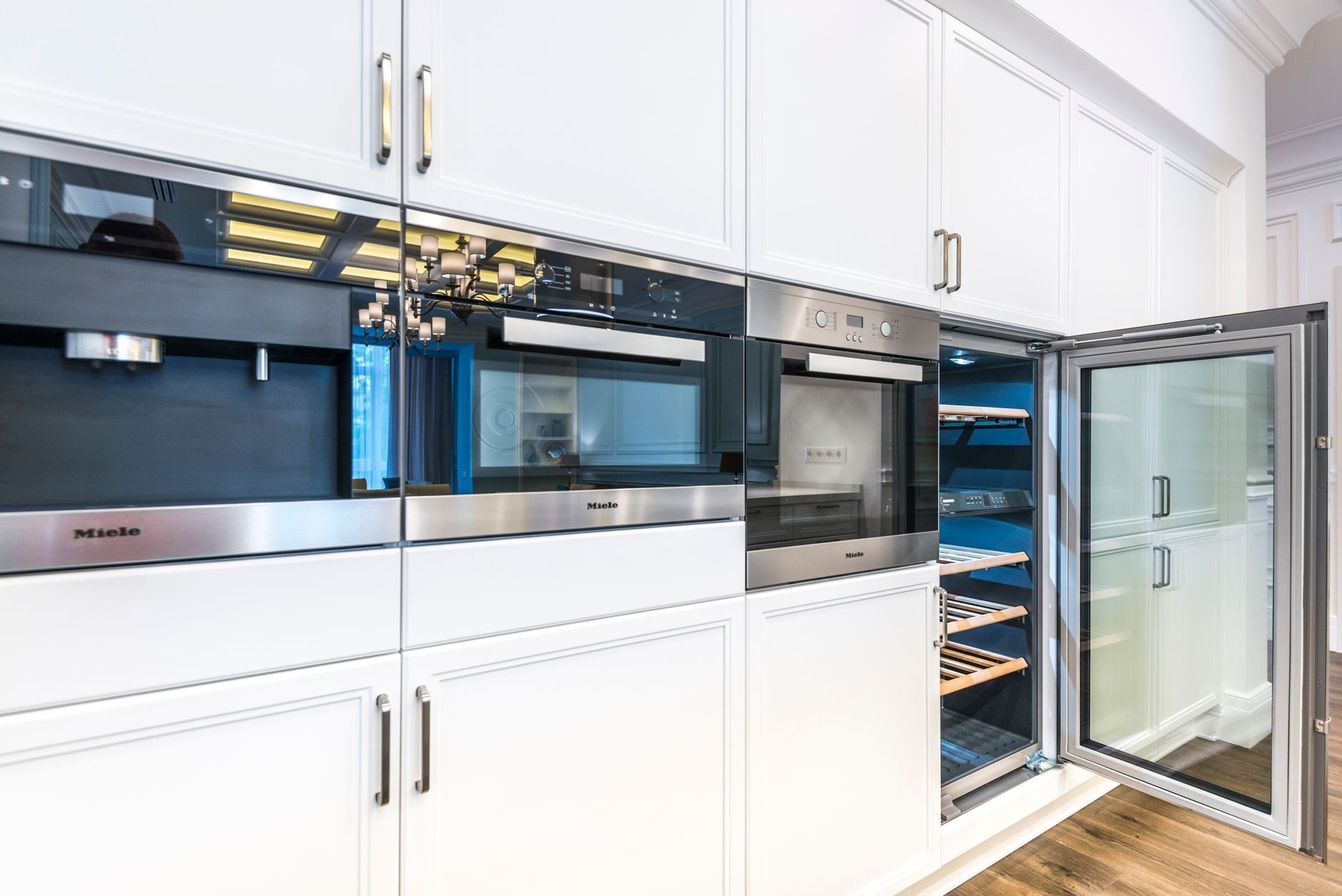 Upscale butler's pantry with built-in cabinetry and wine storage